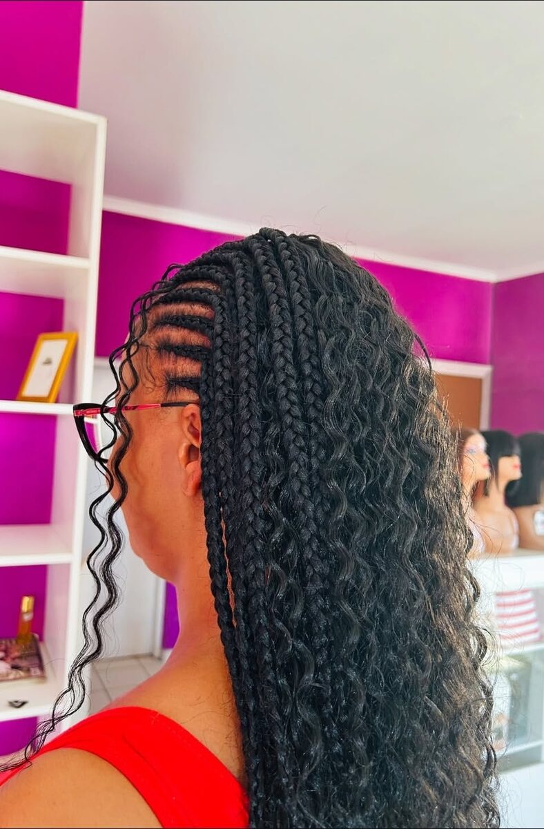 Braids with curly ends, side profile